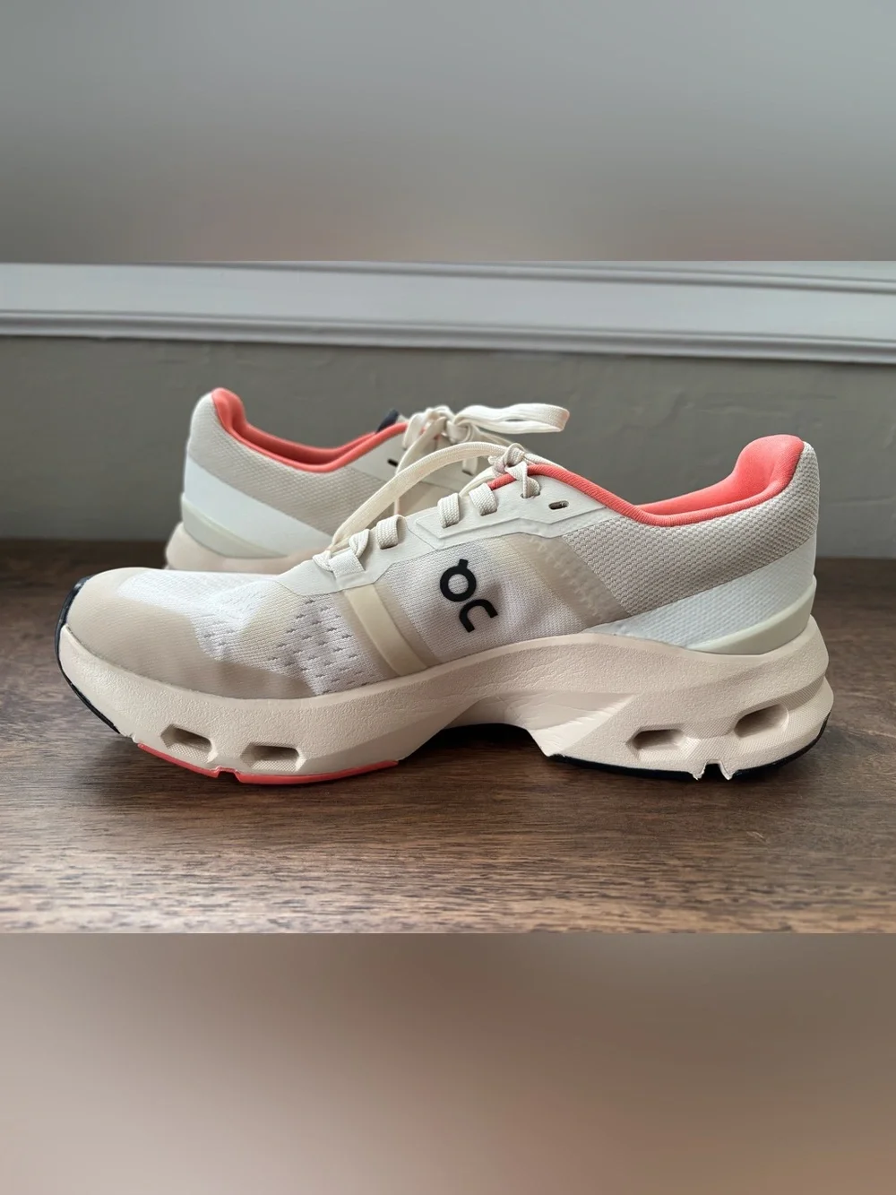 On Women's Cloudpulse Sneakers in Cream with Coral Lining